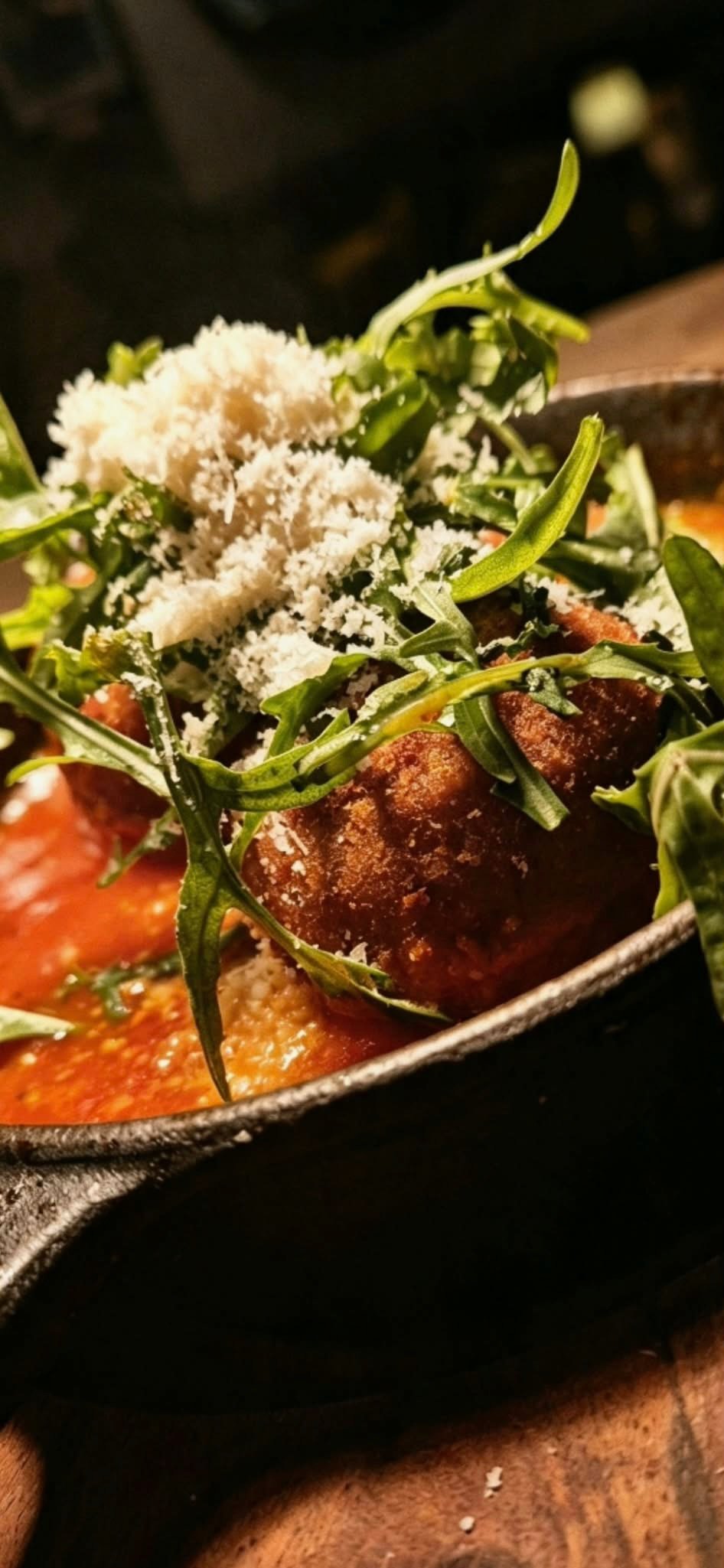 A freshly prepared salad with herbs and cheese